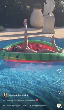 Liz Hurley poses totally nude on a slice of watermelon Liz Hurley poses totally nude on a slice of watermelon