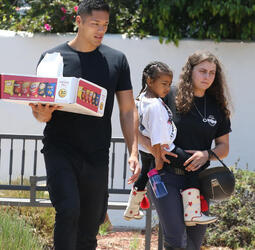 Nori West takes her puppy Sushi to the park to see horses Nori West takes her puppy Sushi to the park to see horses
