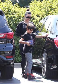 Kourtney Kardashian Is All Smiles After Treating The Kids To A Movie