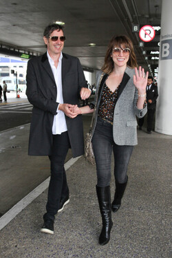 Milla Jovovich and Paul Anderson pictured at Los Angeles International Airport Milla Jovovich and Paul Anderson pictured at Los Angeles International Airport