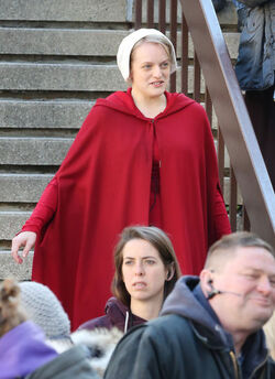EXCLUSIVE Elisabeth Moss in Costume as Offred in The Handmaid s Tale Filming in Toronto.