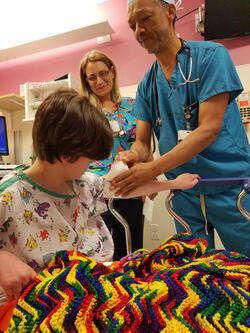 BOY WITH TWO FACES DEFIES ODDS