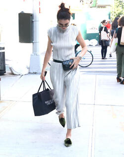 Kendall Jenner wears a fanny pack while shopping in the city Kendall Jenner wears a fanny pack while shopping in the city