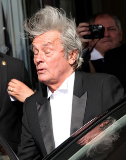 Alain Delon leaves his hotel in Cannes