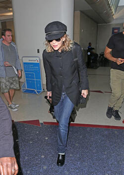 Meg Ryan Tries To Keep A Low Profile Arriving In L.A. After CFDA Awards