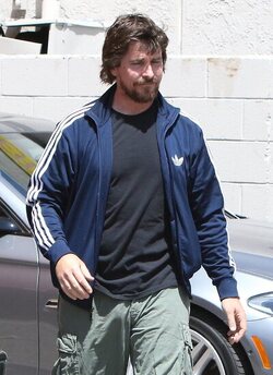 Christian Bale and his wife their their son out for breakfast