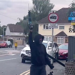 VIDEO Disgruntled masked man hacks down London ULEZ camera in broad daylight 48 hours after it was installed