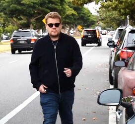 James Corden was spotted in Brentwood climbing into his Aston Martin Rapide sportscar.