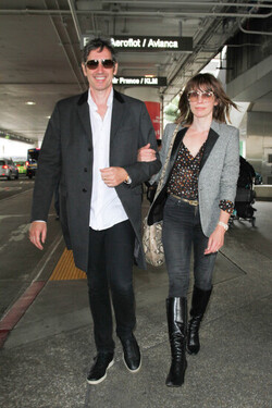 Milla Jovovich and Paul Anderson pictured at Los Angeles International Airport Milla Jovovich and Paul Anderson pictured at Los Angeles International Airport