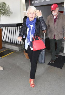 Helen Mirren and Taylor Hackford return from New Orleans where Helen gave a speech for the graduating students 
