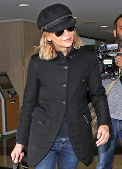 Meg Ryan Tries To Keep A Low Profile Arriving In L.A. After CFDA Awards