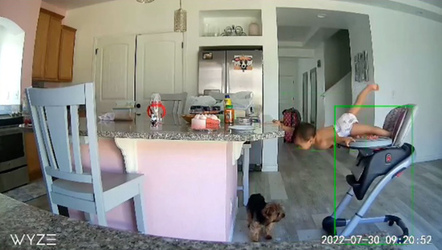 Inquisitive toddler nearly falls from highchair before super mum catches her Inquisitive toddler nearly falls from highchair before super mum catches her