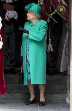 Queen Elizabeth II and Prince Philip Duke of Edinburgh attend a service to mark the 100th anniversary of the Order of the British Empire at St Paul s Cathedral in London.