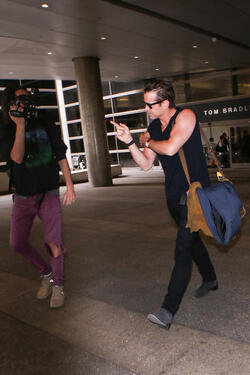 Colin Farrell was spotted in a sleeveless t shirt at LAX