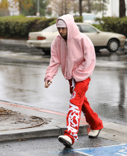 Disheveled Justin Bieber goes go karting in the rain