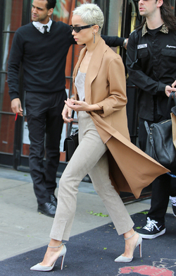 Zoe Kravitz in Beige and Camel Color Leaving Hotel