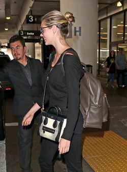 Kate Upton Goes Casual In All Black At LAX