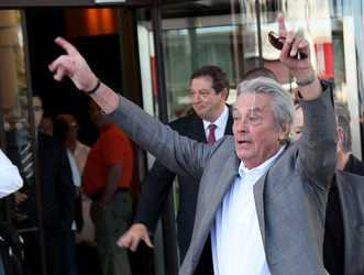 Alain Delon leaves his hotel in Cannes