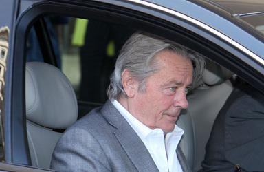 Alain Delon leaves his hotel in Cannes