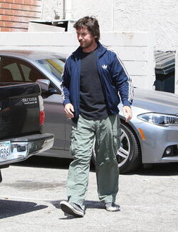 Christian Bale and his wife their their son out for breakfast