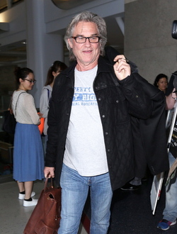 Goldie Hawn and Kurt Russell arrive at the airport