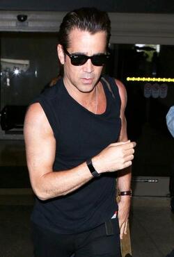 Colin Farrell was spotted in a sleeveless t shirt at LAX