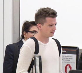 Charlie Puth Gets An Extremely Thorough Pat Down By LAX TSA Charlie Puth Gets An Extremely Thorough Pat Down By LAX TSA