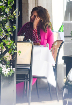 Trinny Woodall smokes outside at Scotts