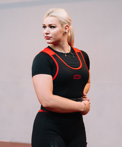 Woman becomes talented powerlifter despite suffering with seizures