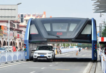 Futuristic Straddling Bus Now Collecting Dust