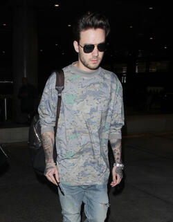 Liam Payne to miss Father s Day with his family as he arrives in LA for work