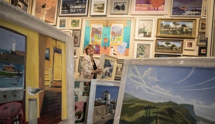 Sophie Miller of the Llewellyn Alexander gallery in Waterloo sifts through the approximately 600 works of art that has been rejected from the annual prestigious Royal Academy exhibition Sophie Miller of the Llewellyn Alexander gallery in Waterloo sifts through the approximately 600 works of art that has been rejected from the annual prestigious Royal Academy exhibition