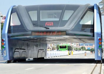 Futuristic Straddling Bus Now Collecting Dust