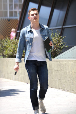 Dave Franco with tablet and bottled drink seen out in Los Angeles Dave Franco with tablet and bottled drink seen out in Los Angeles