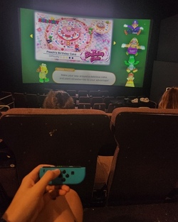 Woman goes viral renting entire CINEMA screen to play video games with mates Woman goes viral renting entire CINEMA screen to play video games with mates