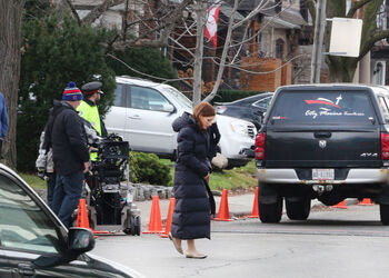 EXCLUSIVE Jessica Chastain Wraps up in a Cashmere Scarf on the Set of Molly s Game.