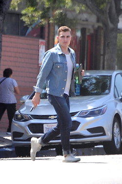 Dave Franco with tablet and bottled drink seen out in Los Angeles Dave Franco with tablet and bottled drink seen out in Los Angeles