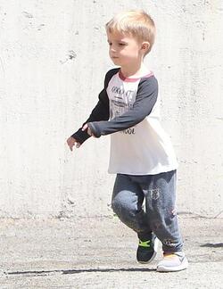 Christian Bale and his wife their their son out for breakfast