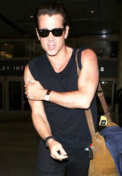 Colin Farrell was spotted in a sleeveless t shirt at LAX