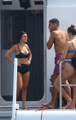 Kourtney Kardashian and boyfriend Younes Bendjima on their boat in the Bay of Cannes