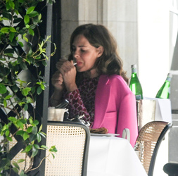 Trinny Woodall smokes outside at Scotts