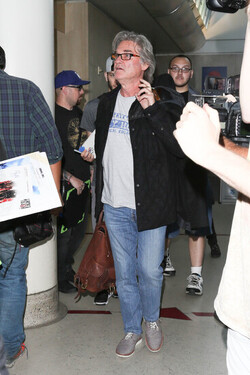 Goldie Hawn and Kurt Russell arrive at the airport