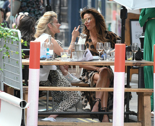 Lizzie Cundy and Anthea Turner seen having a drink with friends in soho