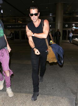 Colin Farrell was spotted in a sleeveless t shirt at LAX