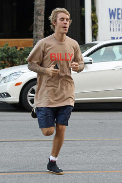 Justin Bieber Goes Jogging and Jumps as he Arrives Back at his Hotel