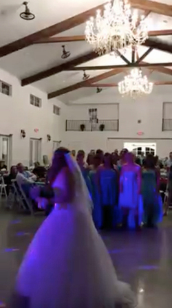 BRAVE BRIDE WITH CANCER THROWS WIG BEFORE FLINGING BOUQUET AT WEDDING RECEPTION