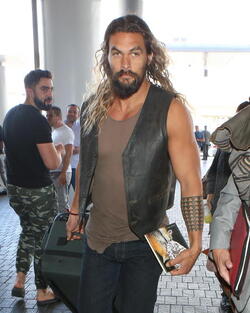 Jason Momoa Clutches His Favorite Pillow Going Through LAX TSA