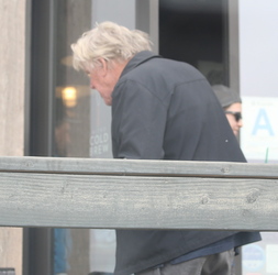 Gary Busey buttons up for the preppy look in Malibu