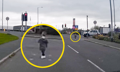 TOT RESCUED FROM ROAD