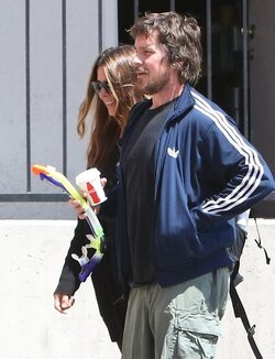 Christian Bale and his wife their their son out for breakfast